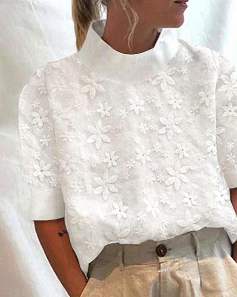 Bluse mit besticktem, einfarbigem Stehkragen