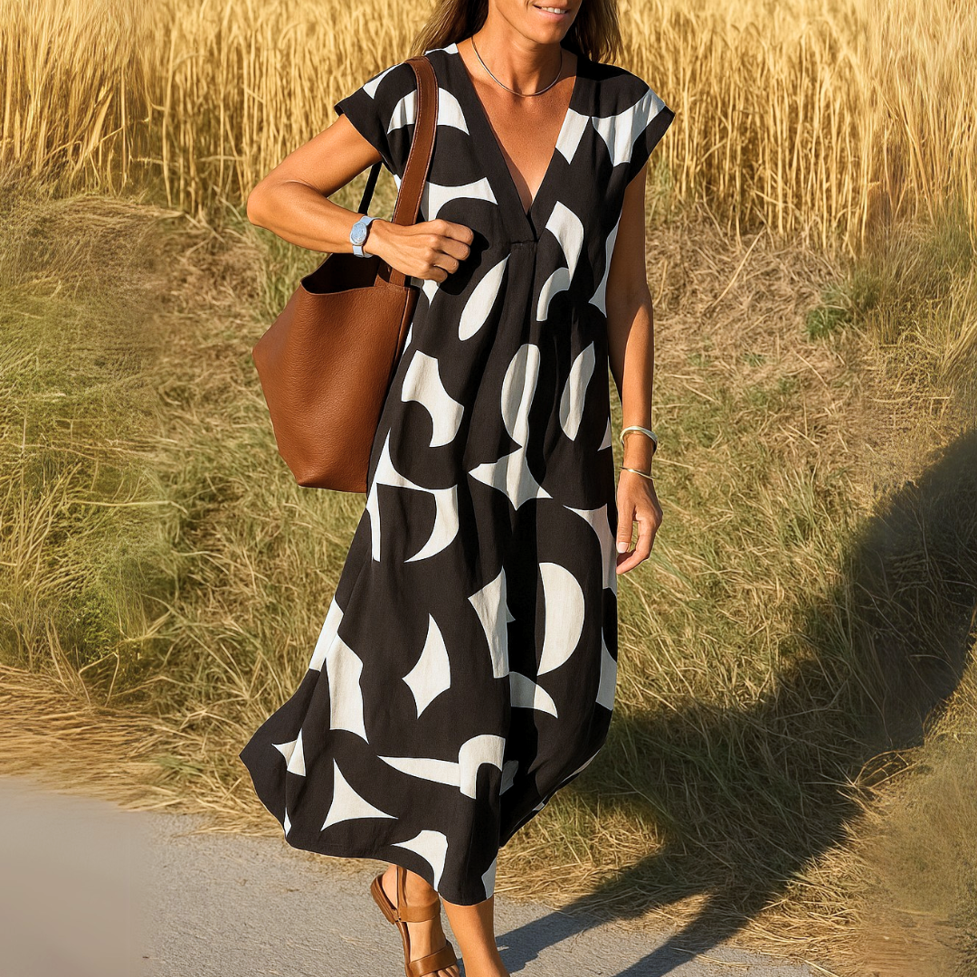Amina™ Kleid – Sommerliche Freiheit mit grafischem Druck