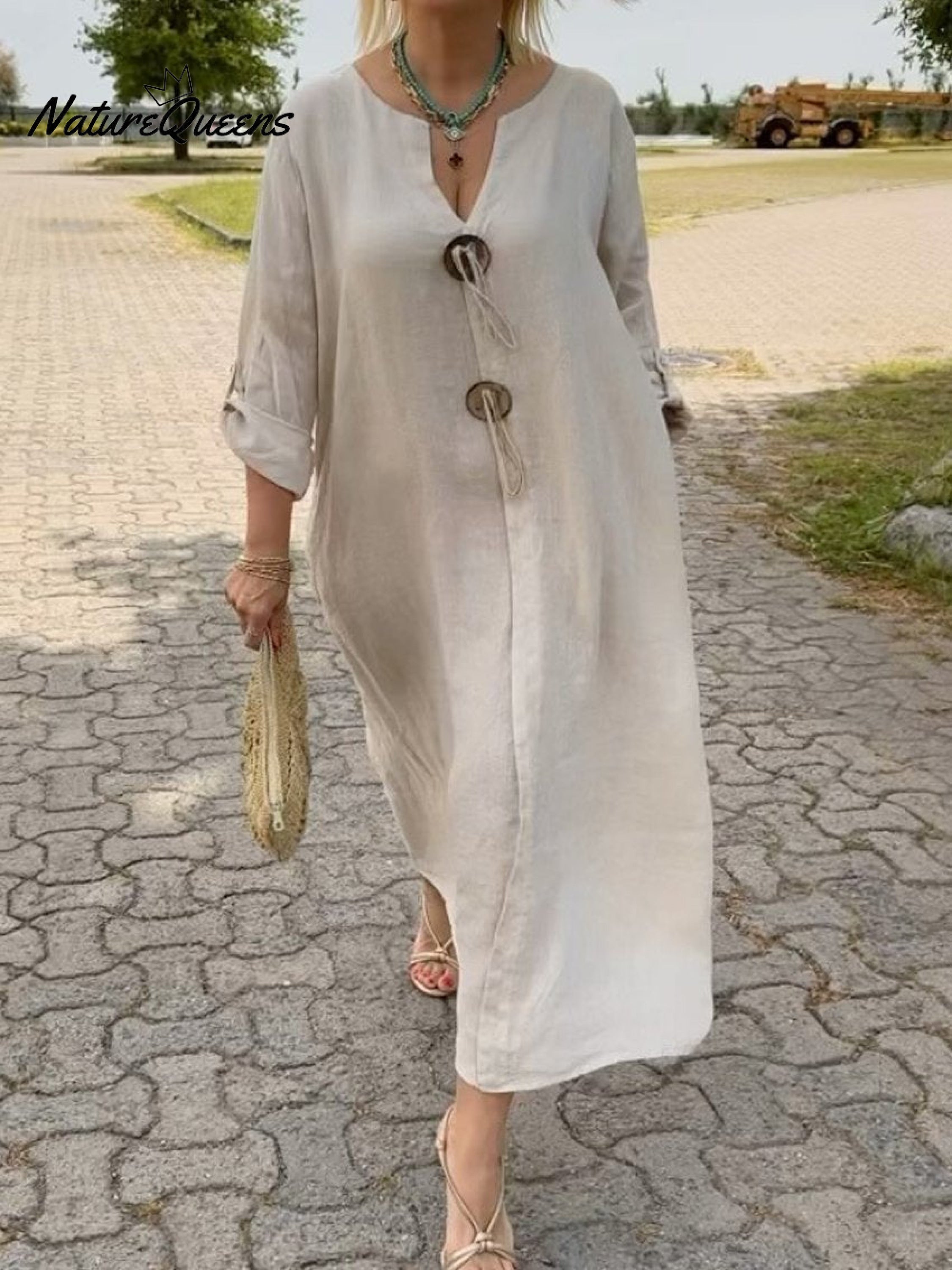 Noor – Lange Kleid mit Holzdetails und lockeren Ärmeln