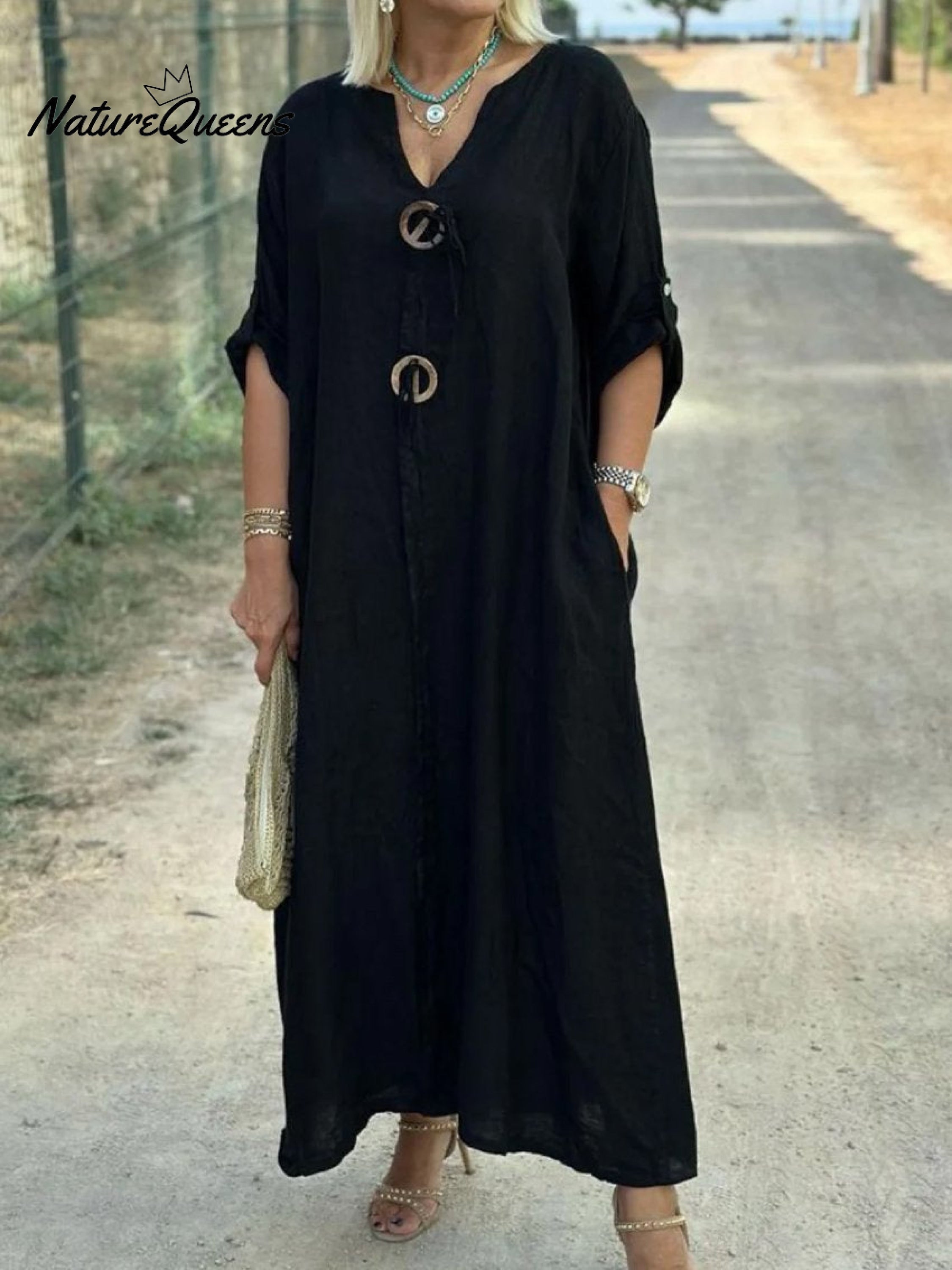 Noor – Lange Kleid mit Holzdetails und lockeren Ärmeln