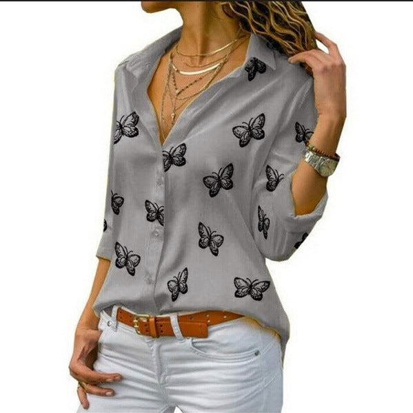 Neleia – Lockere Bluse mit Schmetterlingsdruck