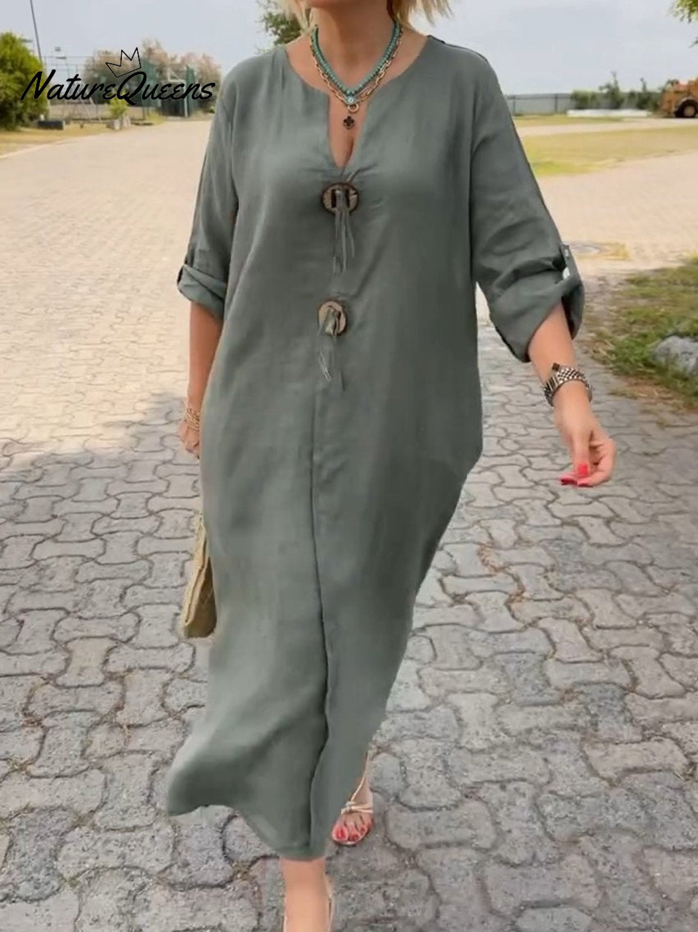 Noor – Lange Kleid mit Holzdetails und lockeren Ärmeln